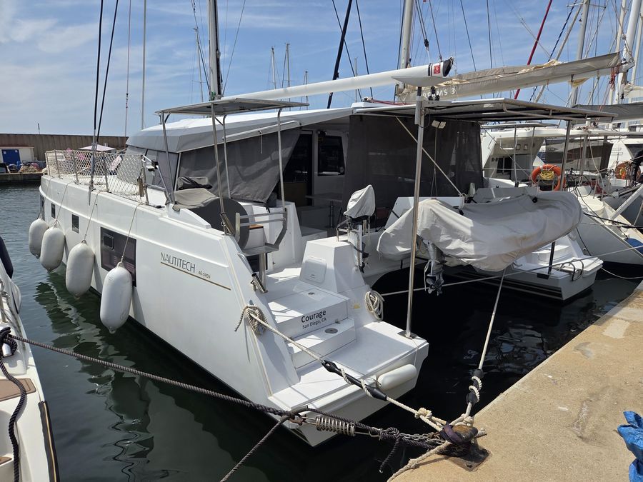 Courage docked stern-to at the dock