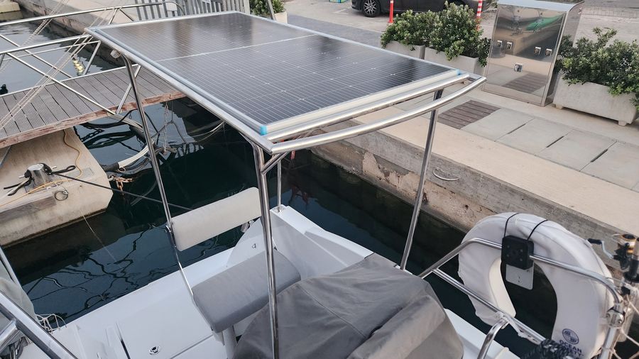 Overhead deck view showing solar panels and fenders