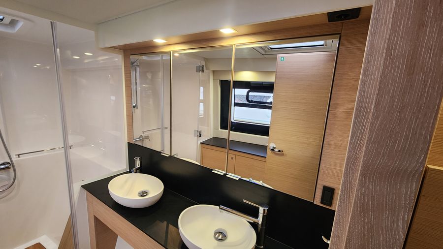 Master head with twin sinks and shower