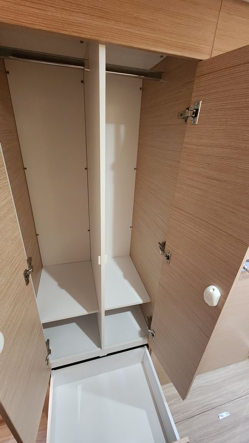 Master cabin hanging locker, shower beyond