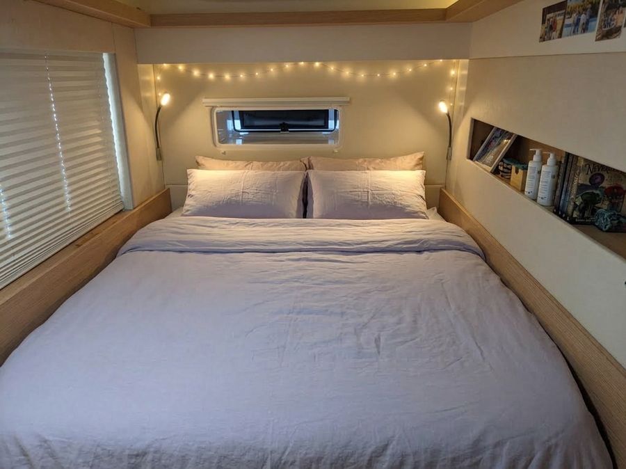 Cabin berth strung with fairy lights