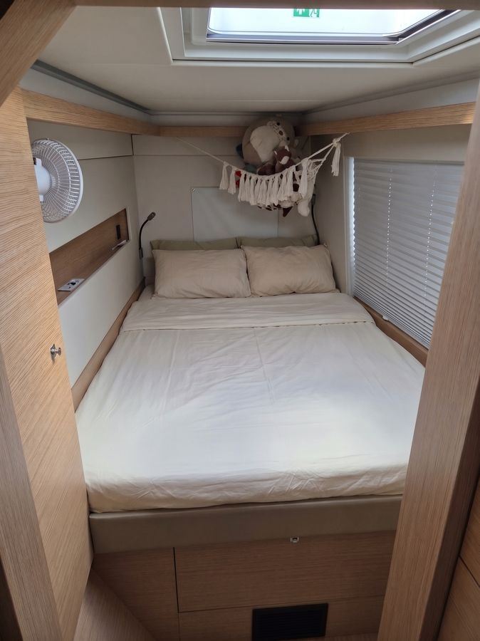 Starboard forepeak berth with overhead hatch