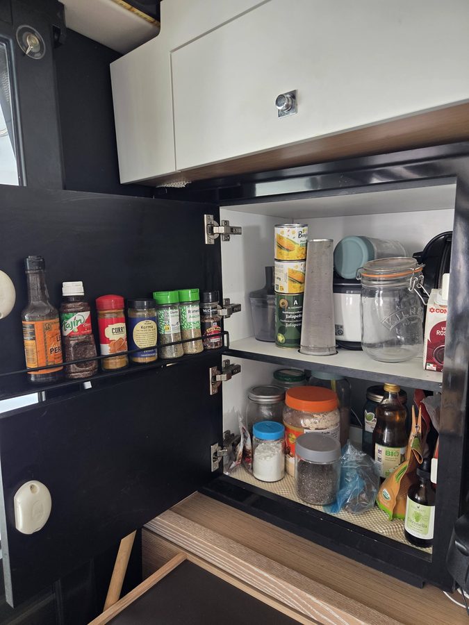 Galley pantry cabinet with spice rack